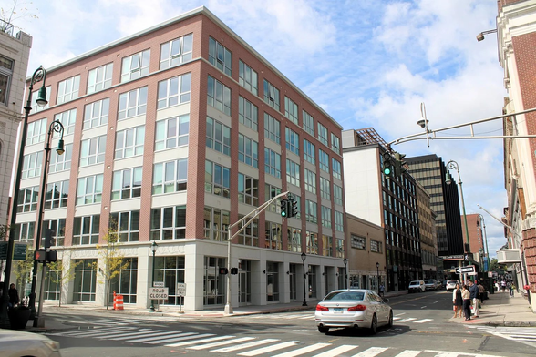 current photo of area with 2 new buildings