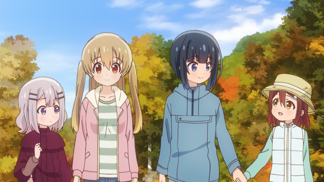 Aiko standing next to Koharu while Hiyori holding Futaba’s hands with a forest changing leave colors.