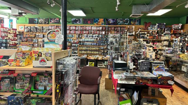 A picture of the inside of the Yellow King Game Store in Colorado Springs. It is crammed with goodies.