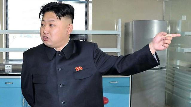 Kim Jong-Un pointing at something. We don't know what, exactly. Maybe he's pointing at hackers.town?