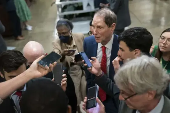 Senator Ron Wyden, a Democrat from Oregon, speaks to members of the media in the Senate subway at the US Capitol in Washington, DC, US, on Thursday, June 1, 2023. (Sarah Silbiger/Bloomberg via Getty Images)