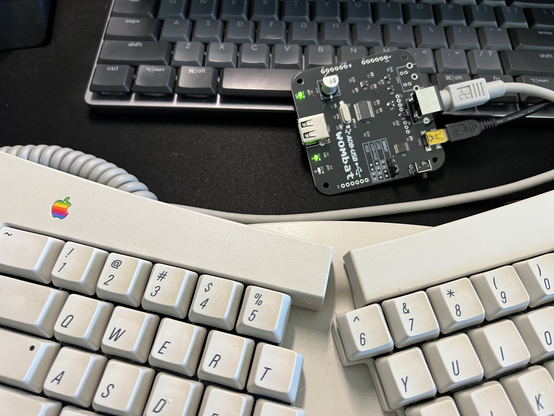 Apple Adjustable Keyboard connected to an ADB-USB Wombat to convert the ADB input to normal USB. (It also goes the other direction, if needed.)