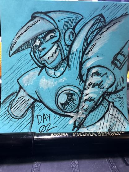 Mega Man 2’s Crash Man drawn on a light blue post it note. He is grinning maniacally as he raises a spinning drill arm towards the viewer.