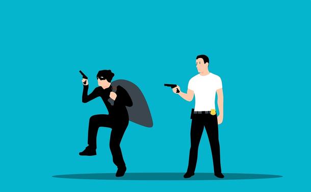 Un voleur pris en flagrant délit par un policier.