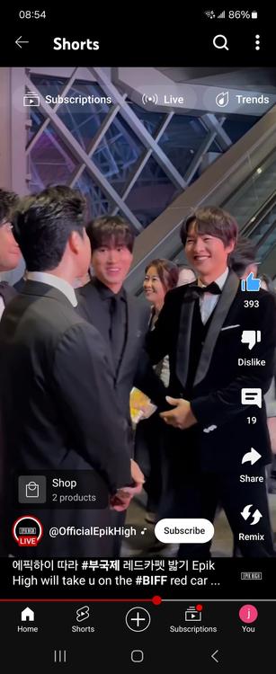 Screenshot of a paused YouTube short by OfficialEpikHigh.

Song Joong-Ki in a tuxedo smiles and shakes Tablo's hand.