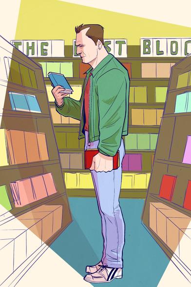 A man looking at videos in the last Blockbuster
