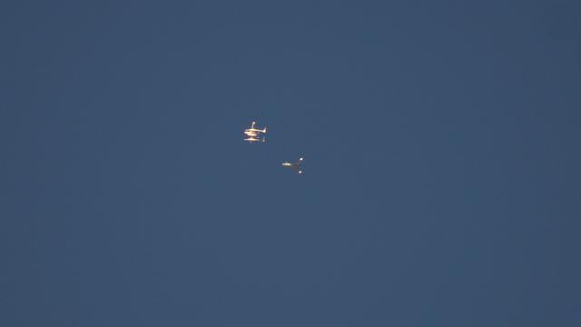White Knight carrier plane with SpaceShipOne followed by Beechcraft Starship chase plane as they climb to altitude above Mojave to air-launch SpaceShipOne for its X-Prize space flight attempt on October 4, 2004

photo by Ian Kluft