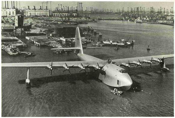 Black and white photo of the plane leave its dock.