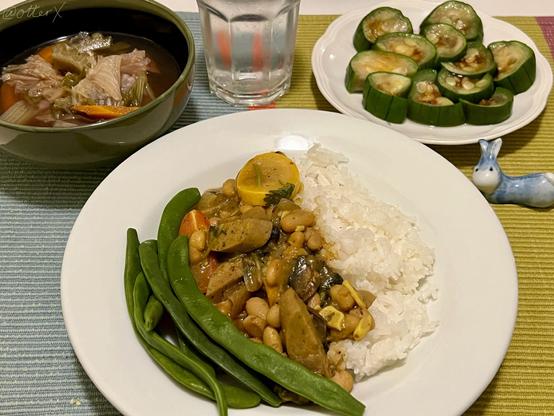 my dinner on the placemat, as described in the main post. A glass of lemon water and the little porcelain bunny hashi-oki are also on the placemat.