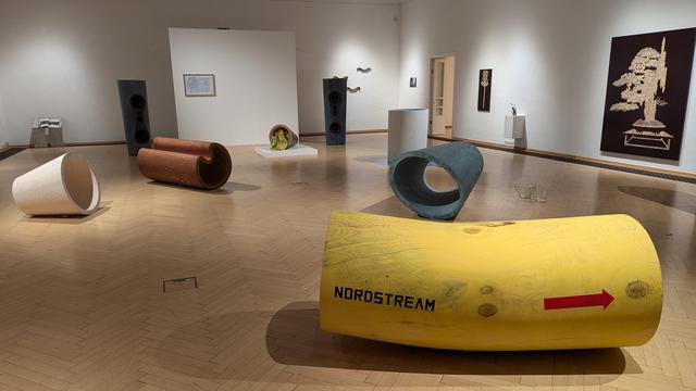 various pipe like sculptures. one is labeled "Nordstream"