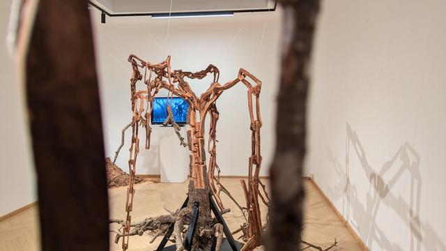 a whole tree, carved out so the wood are now interconnecting chains.