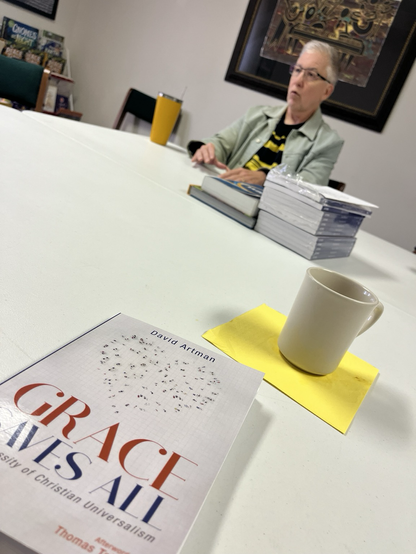 Picture of Dr. David Artman talking about his book, Grace Saves All.