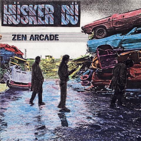 The cover art is a drawing of three human figures in a car junkyard. All three figures are simply black silhouettes, but the cars and background are coloured in with pencil crayons. The band logo is in the top left corner, with the album name underneath in black letters over a series of horizontal lines.