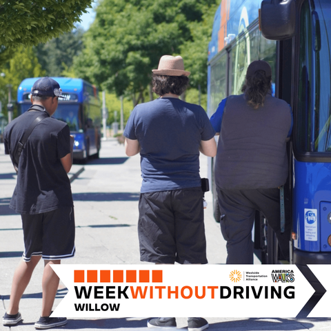 Three people with their backs to the camera, standing at a TriMet transit center next to a bus. Week Without Driving Banner, Westside Transportation Alliance and America Walks logos, "Week Without Driving, Willow"