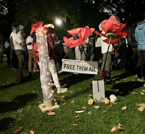 sign: "Free Them All"