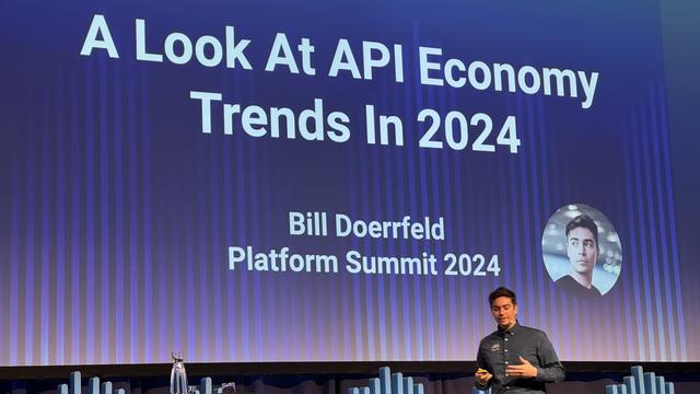 A handsome speaker presents at the Platform Summit 2024, with a slide titled "A Look At API Economy Trends In 2024." The speaker is Bill Doerrfeld and there is a circular photo of him on the slide.