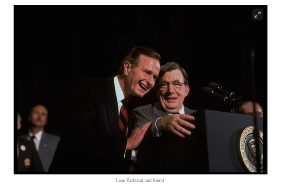 image of US President George H. W. Bush snuggling Lane Kirkland, President of AFL-CIO (1979-1995). 

caption: "Lane Kirkland and friend."