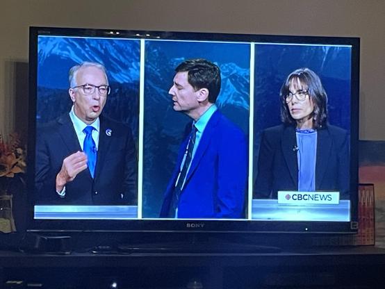 two look to the left as the conservatice leader accuses