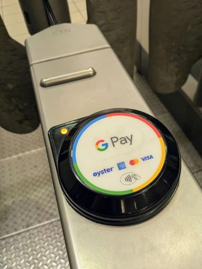 An NFC payments terminal seen at a faregate at a station in the London Underground.