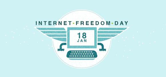 A computer screen with a keyboard down. The screen contains text "18 JAN". It has an eagle-like wings and legs. On the top, there is a text "INTERNET FREEDOM DAY".