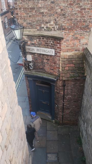 Looking down from a gatehouse on the medieval city wall