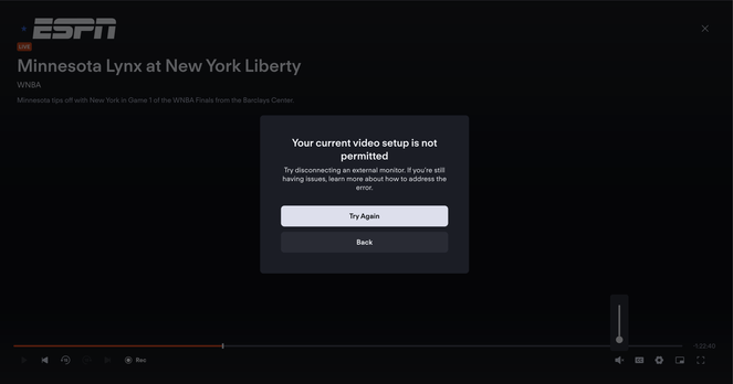 A screenshot of the fubo.tv website that features an error message that reads “Your current video setup is not permitted. Try disconnecting an external monitor. If you’re still having issues, learn more about how to address the error.” And there is a “try again” and “Back” button.