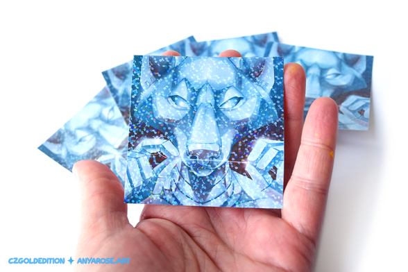 Hand holding out a holographic sticker of a Sorayama style anthro wolf android.