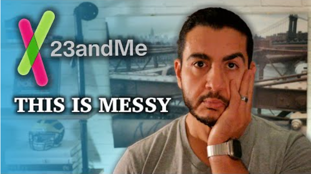 Thumbnail of the video: The image shows Dr. Abdul El-Sayed sitting with his hand on his chin, looking worried. He is wearing a gray shirt and a watch. In the background, a messy bookshelf with various items on it can be seen. In the upper left corner, a logo for “23andMe” can be seen. The image is a bit blurry and the colors are washed out, creating an overall feeling of disorder and unease. The text “THIS IS CHAOS” is superimposed over the image.