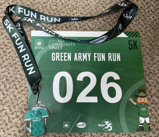 My running number (026) and the finishers medal which is in the colours of Plymouth Argyle's first kit this season.