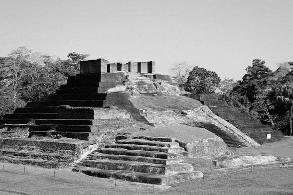 a B&W photo of the pyramid of Comalcalco, Tabasco Mexico, this archaeological zone belonged to the mayan culture whose main material was stucco cover and baked bricks instead of rocks.