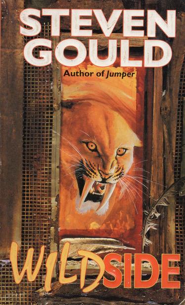 A scan of a single book cover, titled Wildside by author Steven Gould.  Image shows a snarling saber-tooth tiger leaping through what appears to be a wooden window or portal.