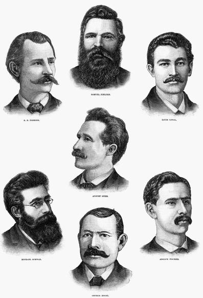 Portraits of the seven prominent Chicago anarchist leaders who were sentenced to death in conjunction with the 1886 Haymarket bombing. Top row: Albert Parsons, Samuel Feldman, Louis Lingg. Middle: August Spies. Bottom row: Michael Schwab, George Engel, Adolph Fisher. Feldman and Schwab have bushy beards. All the others have moustaches. By Frank Leslie's Illustrated Newspaper - http://www.lucyparsonsproject.org/images/images_haymarket8_large.jpg, Public Domain, https://commons.wikimedia.org/w/index.php?curid=3416901