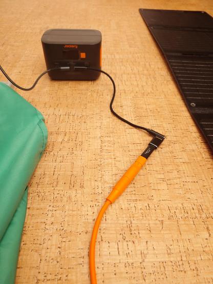 A series of USB adaptors (in connected view) that make a male USB C from a solar panel into a female USB A socket for a USB C to USB A cable to charge the battery via the USB C port... in theory