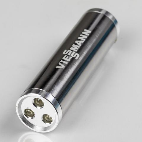 Kleine Taschenlampe mit Ausrichtung nach links unten. Zu erkennen sind dort 3 LEDs. Aufdruck "Viessmann" längs
