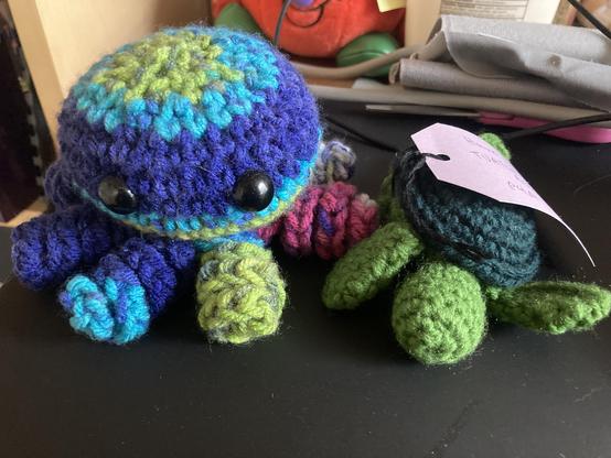 My previous Nerdfighter art perks - two knitted / crocheted animals, a rainbow octopus and a green sea turtle.