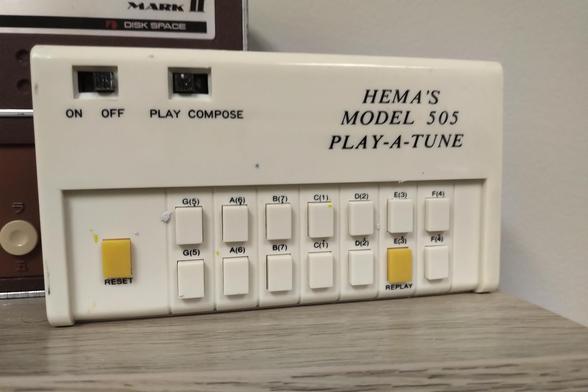 hema's model. 505 play a tune, cream colored contraption