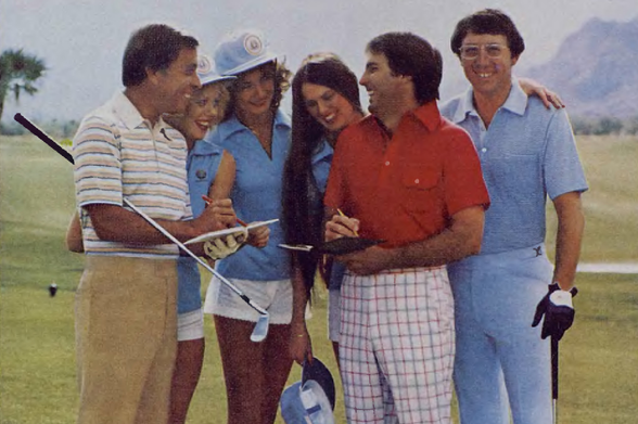 1979 

The image depicts a group of five individuals, presumably golf enthusiasts or players, standing on a grassy field with mountains visible in the background.
They are dressed in casual sports attire typical for that era and seem to be engaged in an informal discussion about their game.
Tags: vintage, 1970s fashion, outdoor activity, golfing, mountain landscape