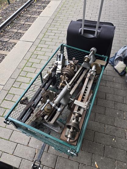 A handcart full of small, beaten up watchmakers lathes