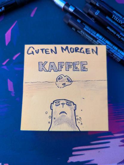 In einer Parodie des klassischen JAWS Plakats, schwimmt unter dem Schriftzug "KAFFEE" eine Kaffeetasse. Darunter taucht, bedrohlich der officebear auf