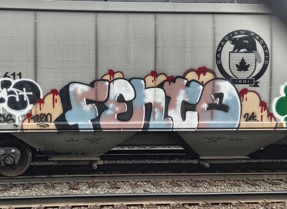 Train car with graffiti rolling through Kamloops BC Canada