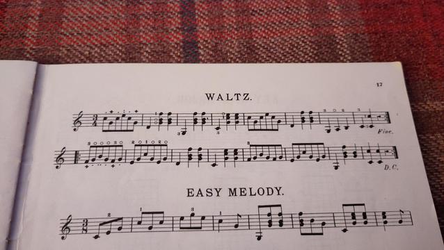 Sheet music with standard notation, a little two line tune labelled Waltz.