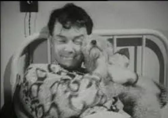 b&w screen cap Monty kissing
