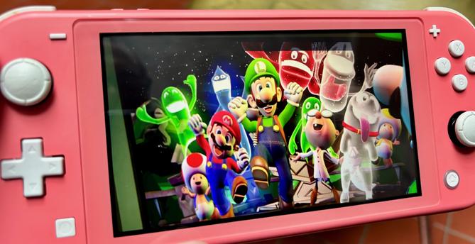 The image shows the final screen from the game, where Luigi is celebrating his victory with his brother Mario and other characters from the game. They are all joyfully jumping in the air, including various colorful ghosts, Toad, Professor E. Gadd, and Luigi’s ghostly dog companion. The scene is full of vibrant energy, symbolizing the successful end of the ghost-hunting adventure. Luigi stands triumphantly at the front, showing that he not only rescued his brother but also brought happiness to all the ghosts.
