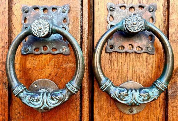A matching pair of Art Nouveau style door handles.