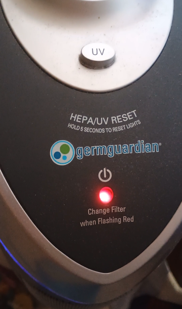 Photo of germguardian with red light flashing indicating need for a filter change.