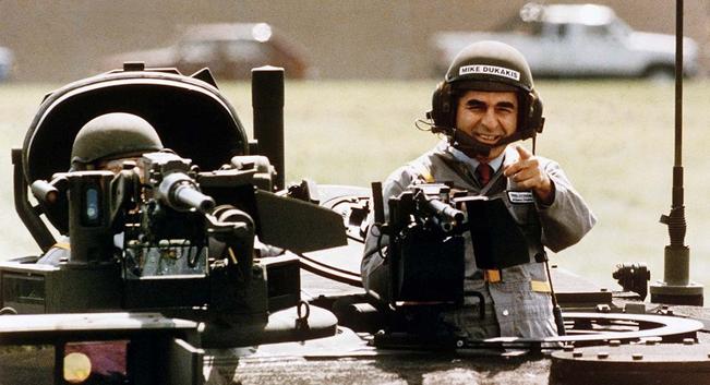 Democratic candidate Michael Dukakis gives a thumbs-up sign from the top of an Abrams battle tank during a Michigan stop on his unsuccessful 1988 presidential campaign.
