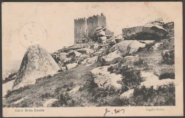 Printed monochrome postcard showing a view of Carn Brea Castle near Redruth and Camborne in Cornwall.
Published by Ernest C. Argall, Truro, Argall's Series, not numbered.
Postally used on 23 July 1904 with single circle Camborne cancellation on green halfpenny stamp and sent to Miss F M Webster, c/o Mrs Rogers, 39 Chapel Street, Penzance.
Good condition, with slight corner bumps, and heavy postmark showing through.