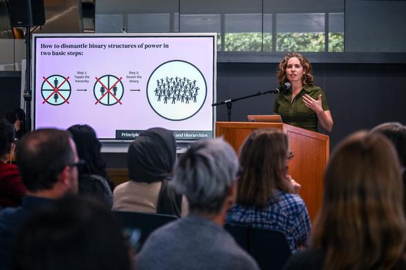 slides about how to eradicate binaries with speaker lauren klein at front