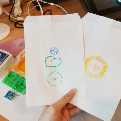 Hand made paper bag with korpokkur and scree stamp