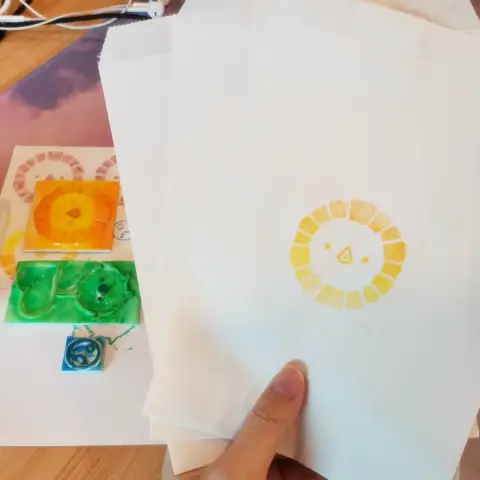 Hand made paper bag with korpokkur and scree stamp
